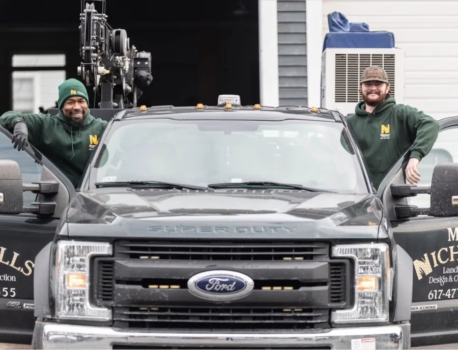 Nicholls Landscaping crew with branded truck and equipment